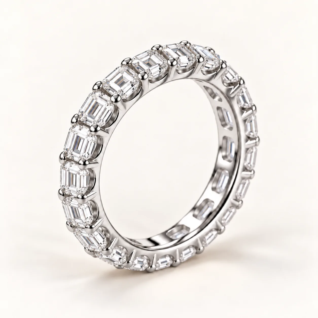 Emerald-cut diamond eternity band in white gold