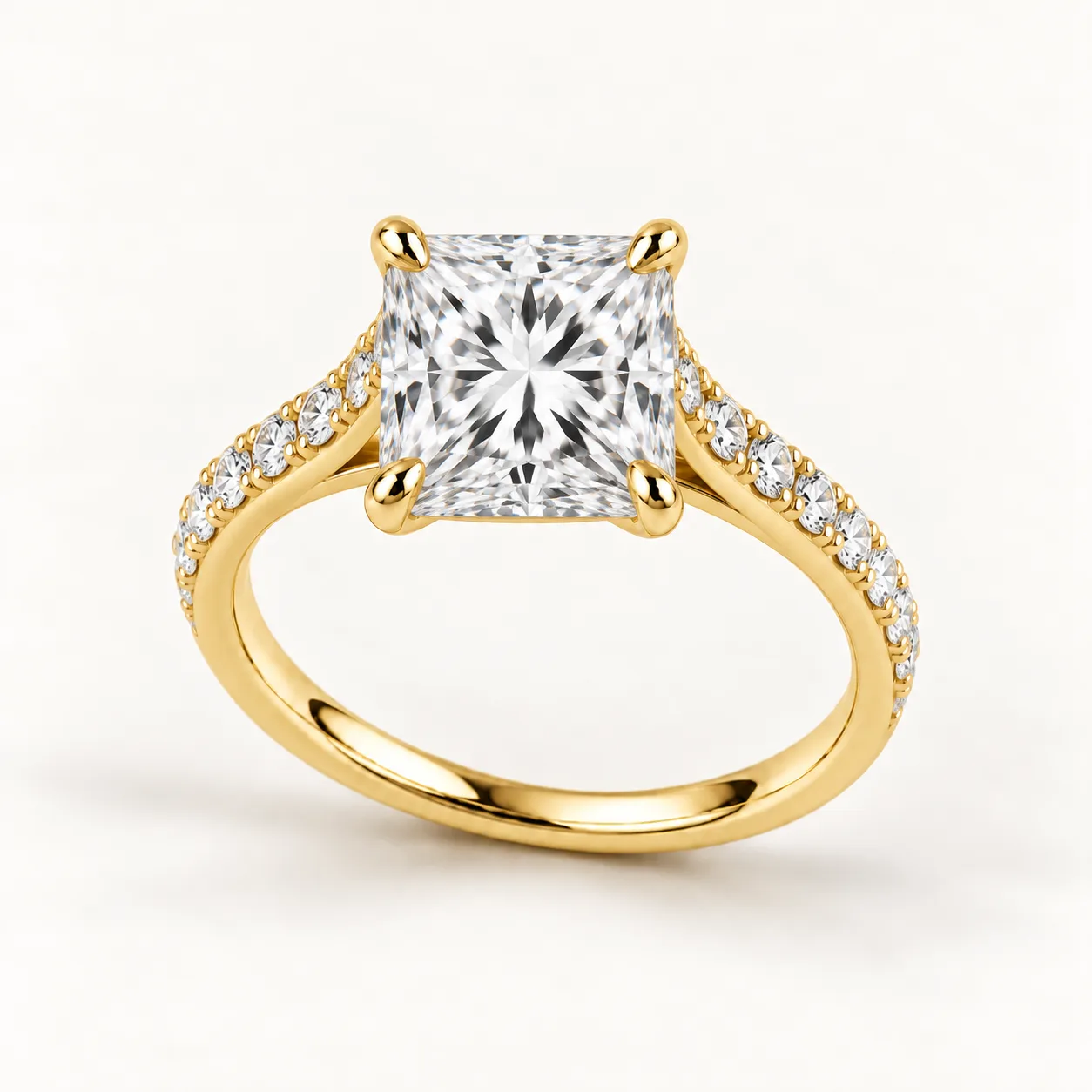 Princess-cut diamond pavé engagement ring in yellow gold