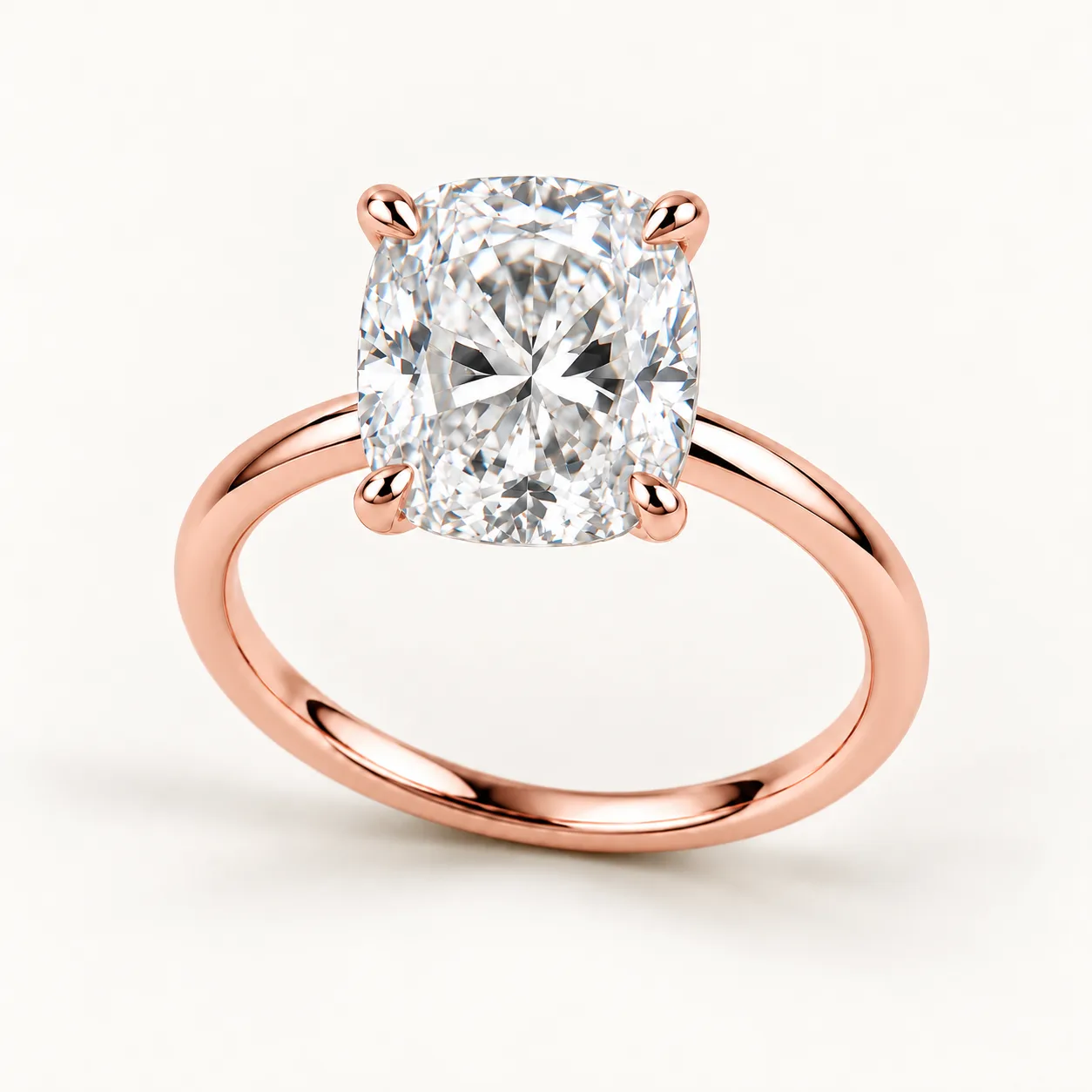 Cushion-cut diamond solitaire ring in rose gold