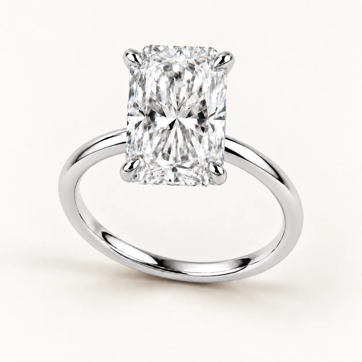 Radiant-cut diamond solitaire ring in platinum
