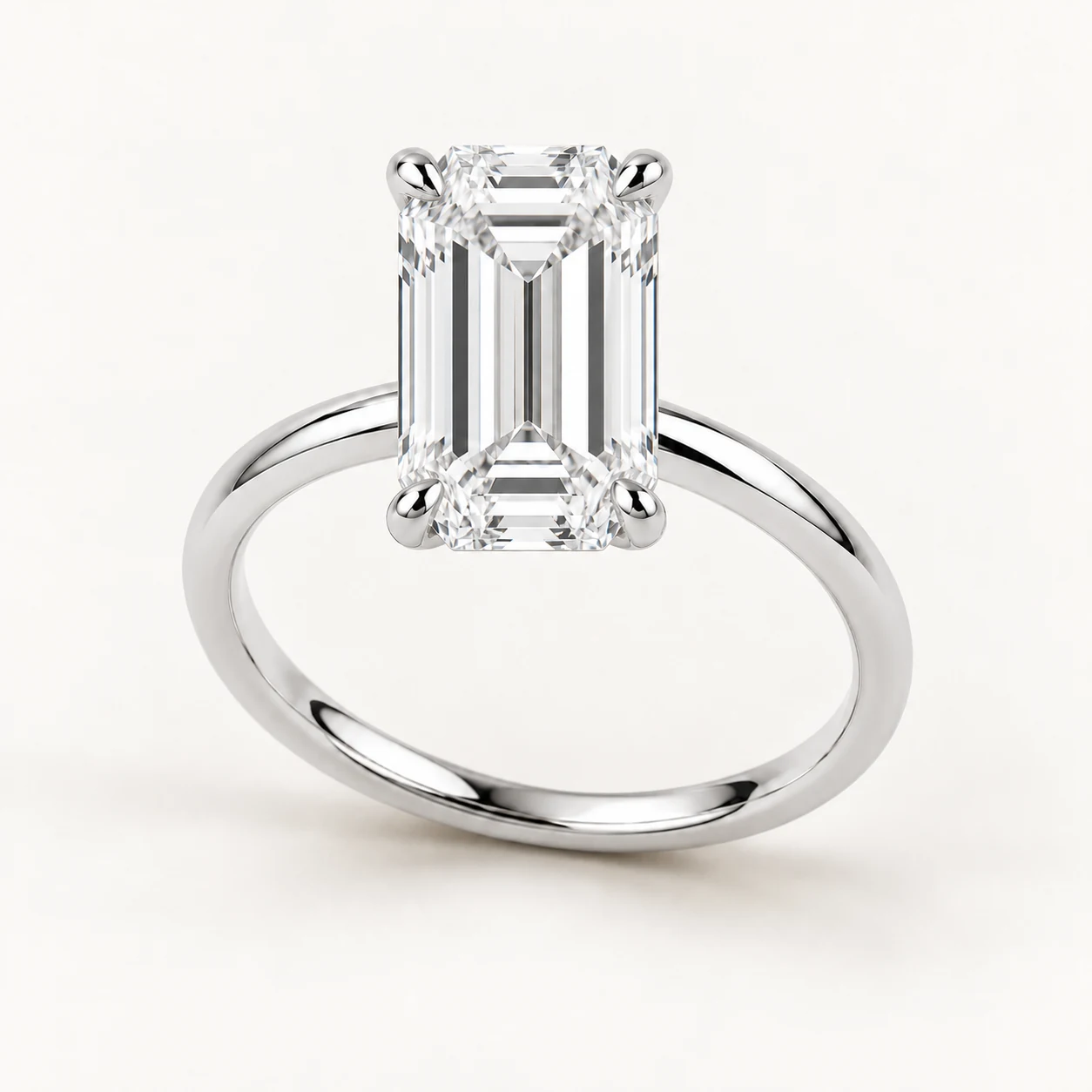 Emerald-cut diamond solitaire ring in white gold