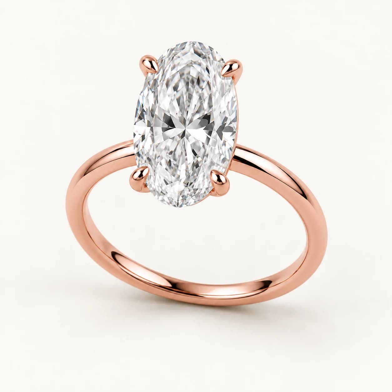 Oval diamond solitaire ring in rose gold