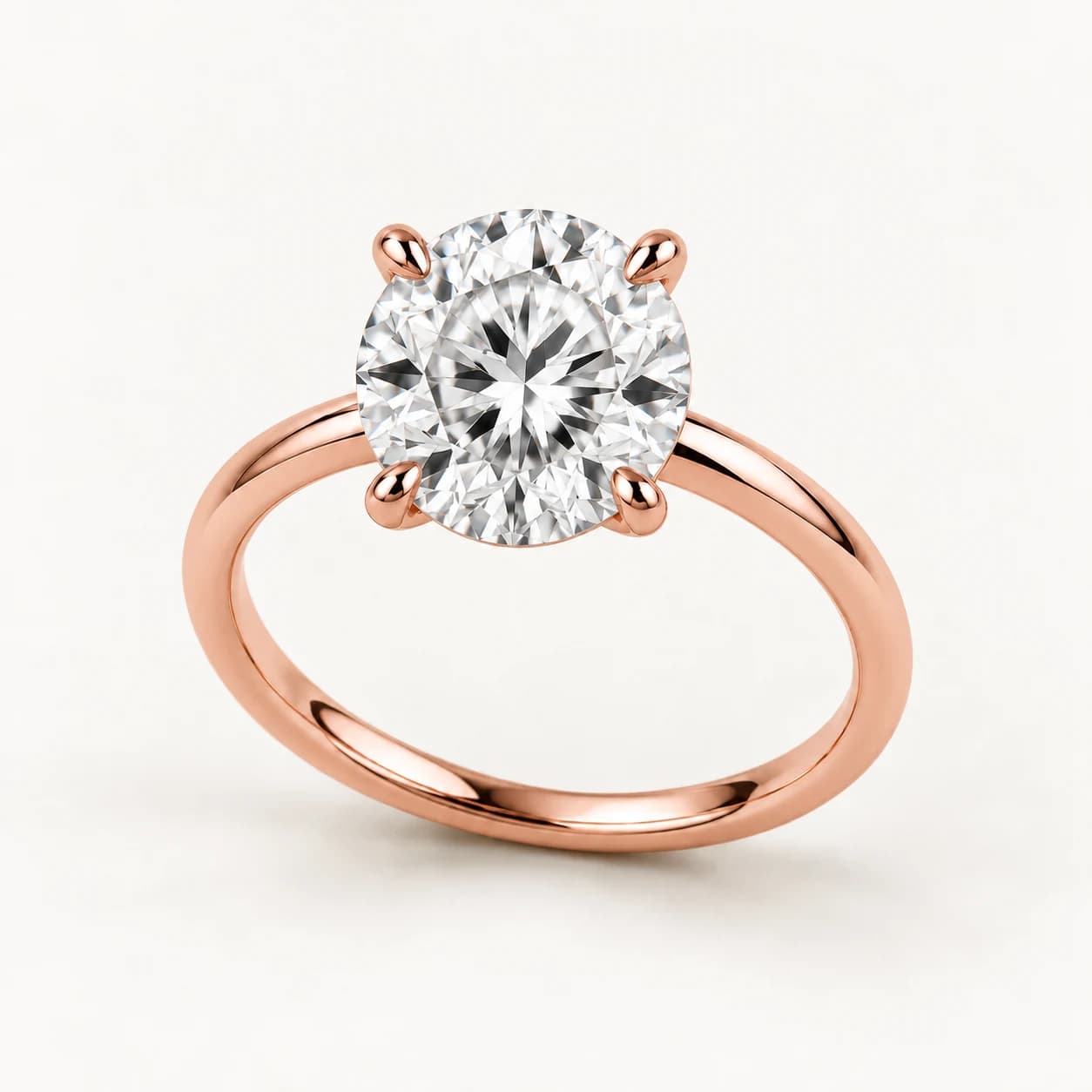 Round diamond solitaire ring in rose gold