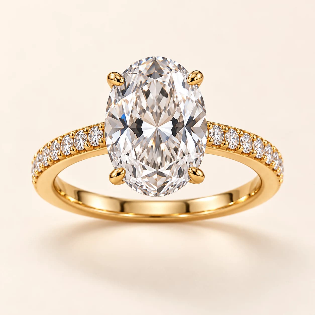 Oval pavé engagement ring in yellow gold, front view