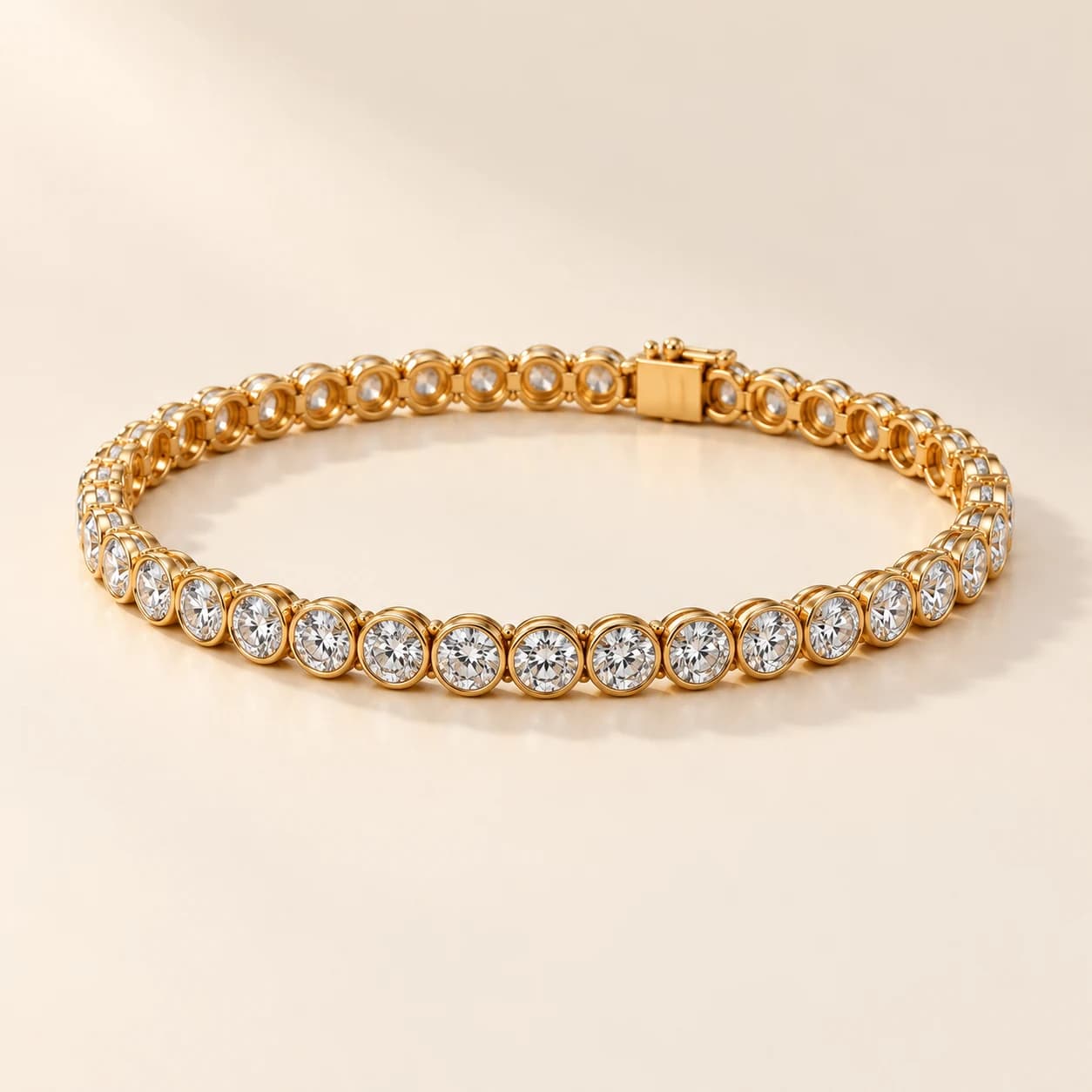 Bezel-set diamond tennis bracelet in yellow gold